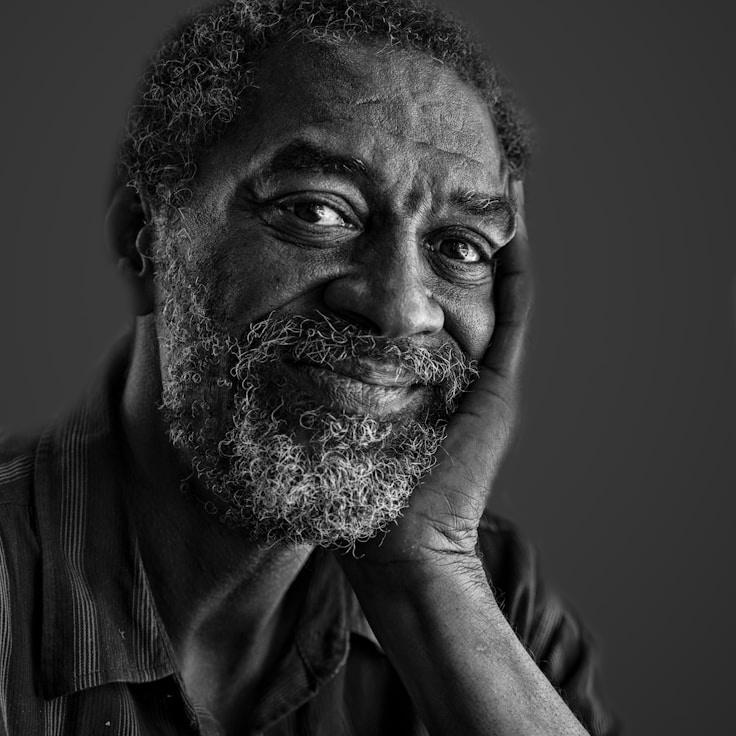 Lena Kapoor, Lead Design Curator at WanderRoamStride, reviewing corporate floral arrangements